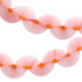 Pink Honeycomb Fan Garland with soft pink paper fan decorations and orange centers hanging in curved strands on a white background.