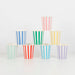 Mixed Stripe Cups arranged on a white background with assorted colorful vertical stripes in blue, green, pink, yellow, red, mint, teal, and lavender.