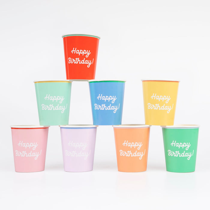 Mixed Happy Birthday paper cups in assorted bright and pastel colors with white birthday lettering.