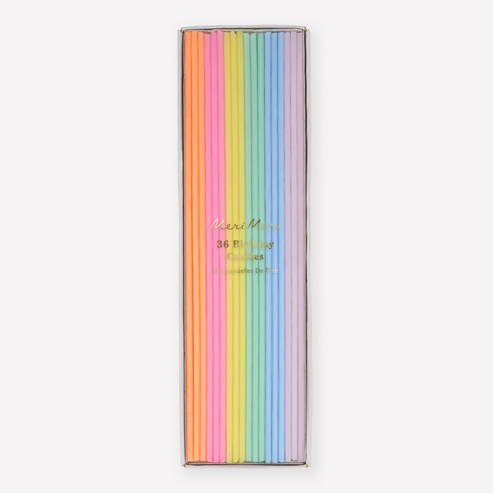 Super Skinny Mixed Candles in clear packaging with 36 extra-slim birthday candles in assorted pastel colors.