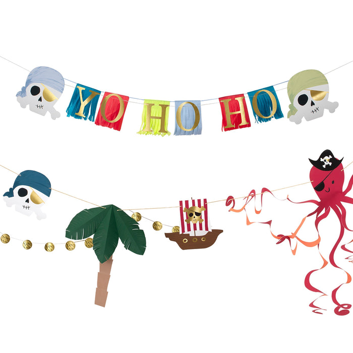 Pirate Icon Garland Set with hanging garlands featuring skulls, a colorful “Yo Ho Ho” fringe banner, gold coins, palm tree, pirate ship, and red octopus on a white background.
