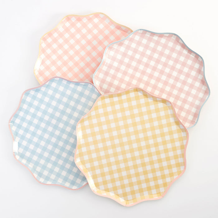 Gingham Dinner Plates in assorted pastel pink, blue, coral, and yellow checkered patterns with scalloped edges on a white background.