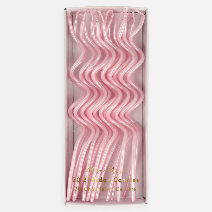 Pink Swirly Candles in clear packaging with 20 long wavy pearly pink birthday candles.