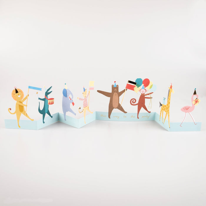 Animal Parade concertina card with illustrated animals, balloons, flags, instruments, gifts, and festive party hats.