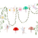 Fairy garland set with pastel fairy cutouts, flowers, mushrooms, leafy vines, and greenery displayed as hanging party décor.