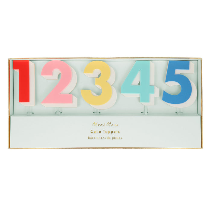 Rainbow Number Acrylic Toppers in packaging with colorful acrylic numbers 1, 2, 3, 4, and 5 shown, part of a 0–9 decorative cake topper set