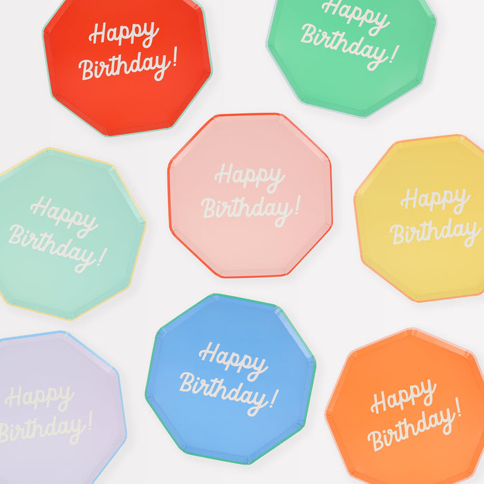 Mixed Happy Birthday Side Plates in assorted bright colors with white Happy Birthday lettering and octagon shapes.
