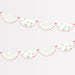 Ditsy Posy Paper Garland with scalloped floral pennants, red trim, and bow-style details on a white background.