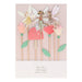 Fairy cake topper set with pastel fairy cutouts, flower picks, green leaves, and a mushroom accent on wooden-style sticks.