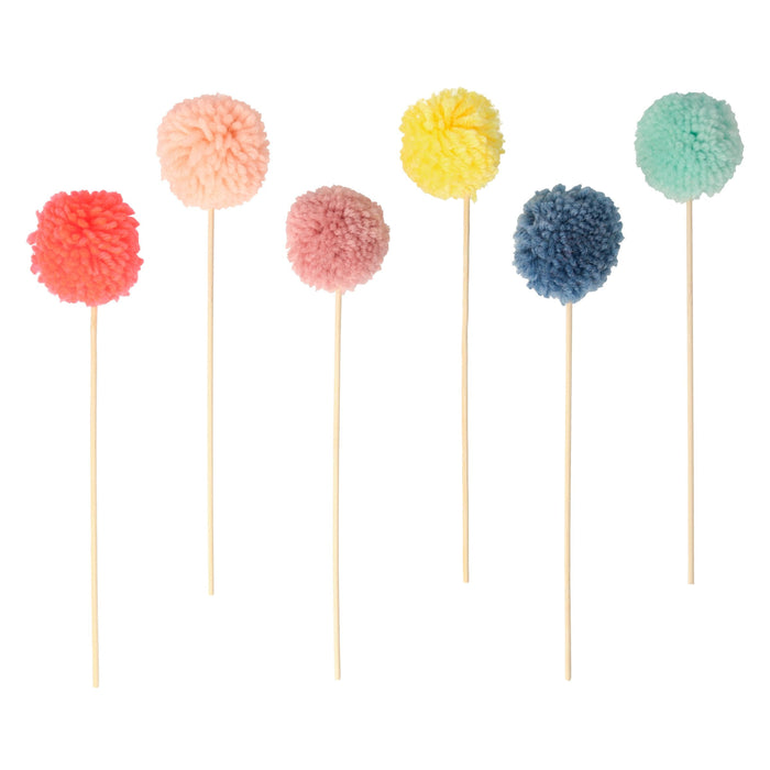 Multi Pompom Cake Toppers with six fluffy colorful pom poms in coral, peach, pink, yellow, blue, and mint on wooden picks.