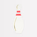 Bowling pin-shaped napkins with red stripe details and gold accents.