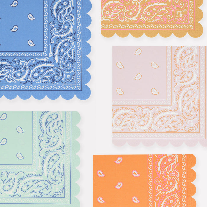 Western Large Napkins with assorted bandana-style paisley prints in blue, mint, pink, orange, and mustard with scalloped edges.