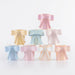 Pastel Bow Cups in assorted soft colors with oversized decorative bow designs.
