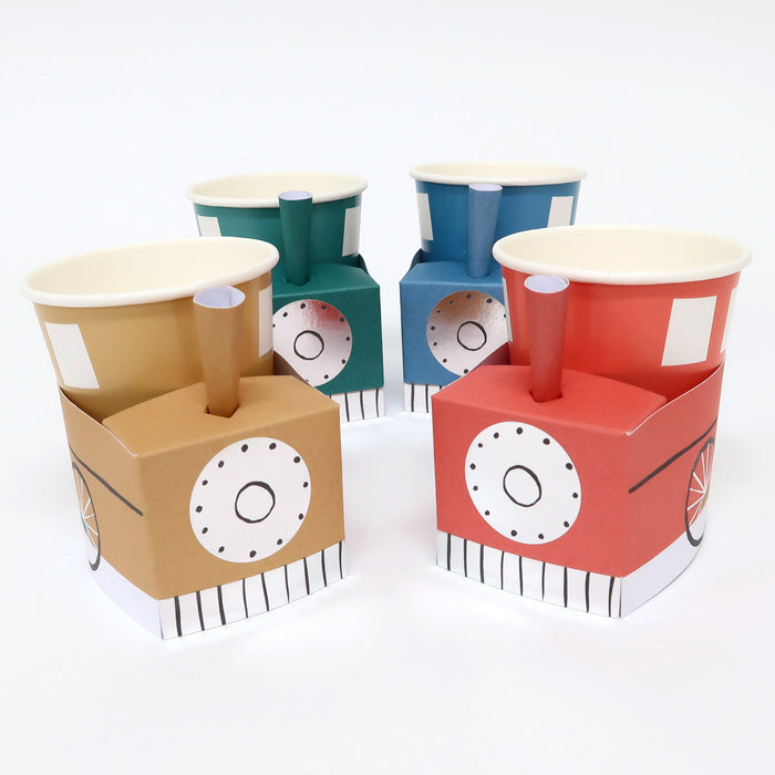 Train Cups in assorted red, blue, green, and tan engine designs with smokestacks, wheels, and window details on a white background.