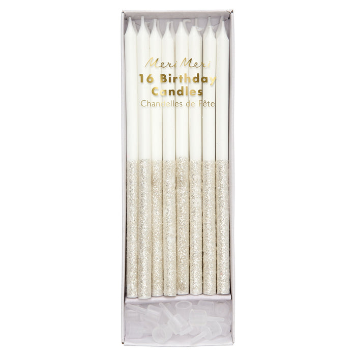 Silver Glitter Dipped Candles in clear packaging with white birthday candles and sparkling silver glitter dipped ends.