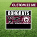 Graduation-themed customizable sign with 'Congrats Grad 2026' text on a grass background