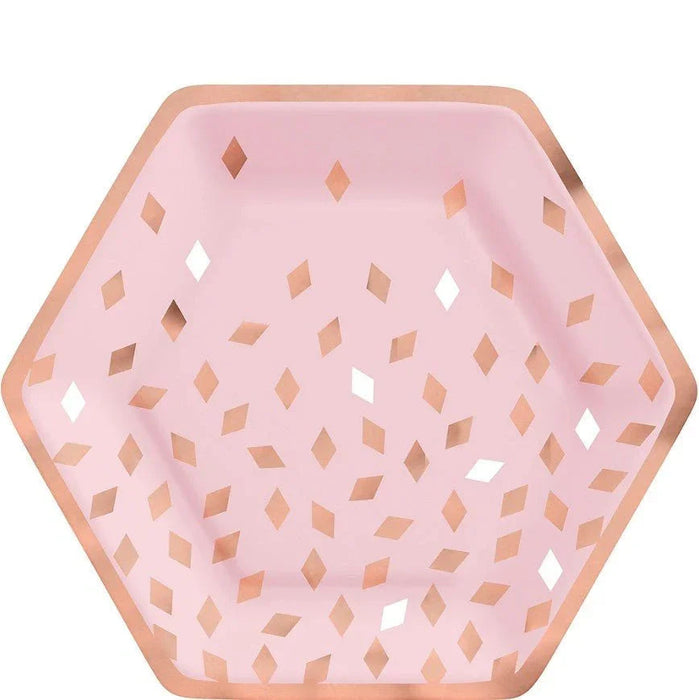 Pink hexagonal plates with rose gold metallic borders and diamond-shaped cutout pattern throughout, set of eight nine-inch lunch plates.