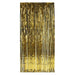 Gold metallic foil fringe curtain with long hanging strands creating a shimmering doorway backdrop.