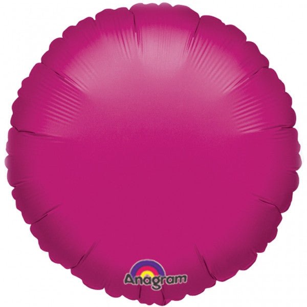 Bright fuchsia round mylar balloon with scalloped edges and Anagram logo at the bottom.