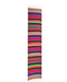 Colorful striped woven table runner with horizontal bands of red, blue, green, yellow, and purple arranged vertically with white fringe at the top and bottom.