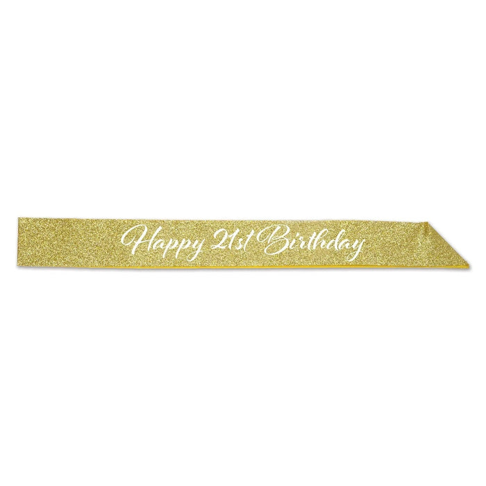 Gold glitter sash with white script text reading "Happy 21st Birthday" on a white background.