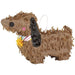 Tan cardboard piñata shaped like a dachshund with a black oval nose, pink circle cheek, black ear, colorful striped ribbon bow, yellow flower accent, and white hanging loop.