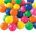 Assorted neon-colored bouncing balls in yellow, orange, pink, green, and blue arranged in a pile against a white background.