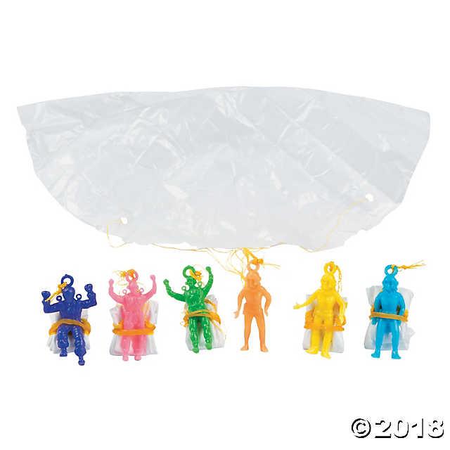 Six colorful vinyl paratrooper figurines in blue, pink, green, orange, yellow, and cyan with a clear plastic parachute canopy above them.