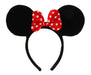 Black mouse ear headband with a red and white polka dot bow centered between the ears.