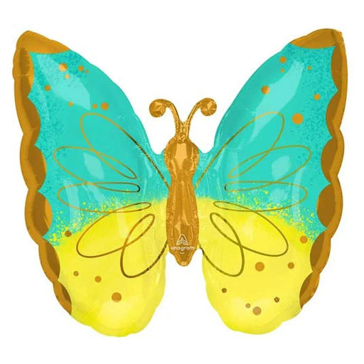 Turquoise and yellow foil balloon shaped like a butterfly with a gold body, antennae, and decorative spots.
