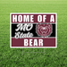 Maroon and white yard sign with bear logo reading "Home of a Mo State Bear" displayed on green grass.