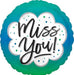 Teal and green ombre round mylar balloon with white cloud-shaped center featuring "Miss You" in black script lettering and colorful polka dots.