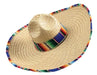 Oversized natural straw sombrero with a colorful woven serape stripe band in blue, red, green, and yellow around the crown.