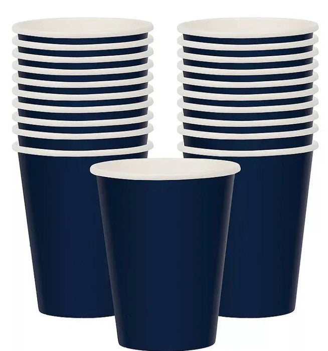 Stack of twenty navy blue and white striped paper cups with cream-colored interiors, displayed in two tall stacks and one single cup in front.