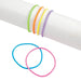 Colorful neon jelly bracelets in green, orange, yellow, and purple arranged on a white cylinder, with two additional blue and pink bracelets displayed below.
