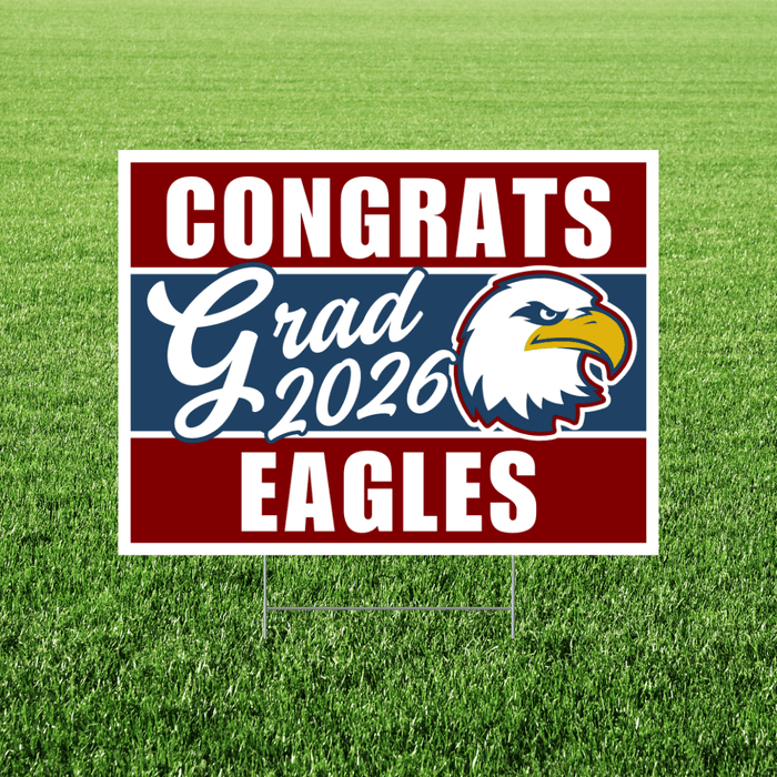 Rectangular yard sign with red and blue horizontal stripes featuring "CONGRATS Grad 2026 EAGLES" text and an eagle head logo in the center.