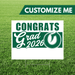 Graduation-themed customizable sign with 'Congrats Grad 2026' text on a grass background
