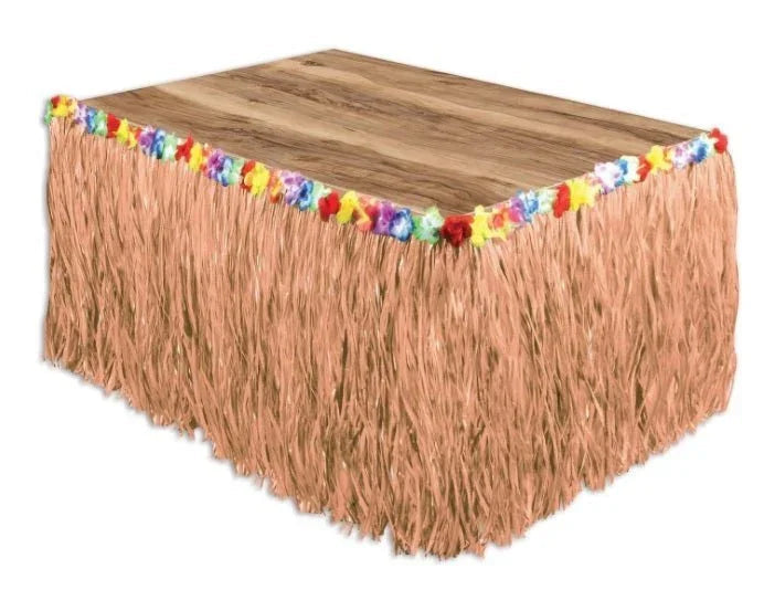 Rectangular table skirt with tan grass fringe trim and multicolored flower garland along the top edge.