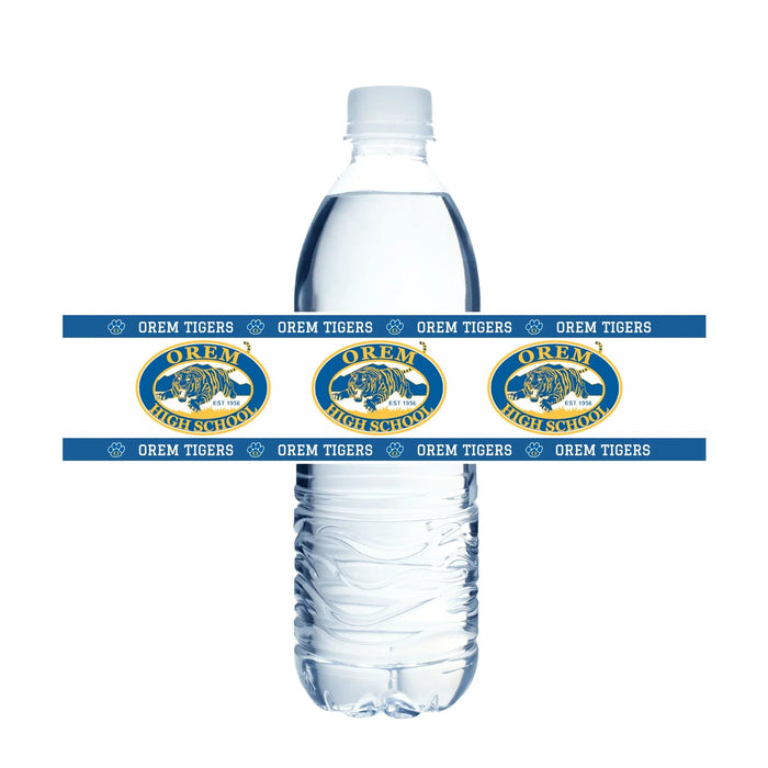 Water bottle wrapped with blue and gold Orem High School Tigers label band featuring three school logos and repeated text around the bottle.