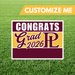 Graduation-themed customizable sign with 'Congrats Grad 2026' text on a grass background