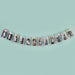 Pastel-colored milestone photo bunting strung horizontally displays twelve labeled cards showing a baby's growth from newborn through twelve months against a light blue background.
