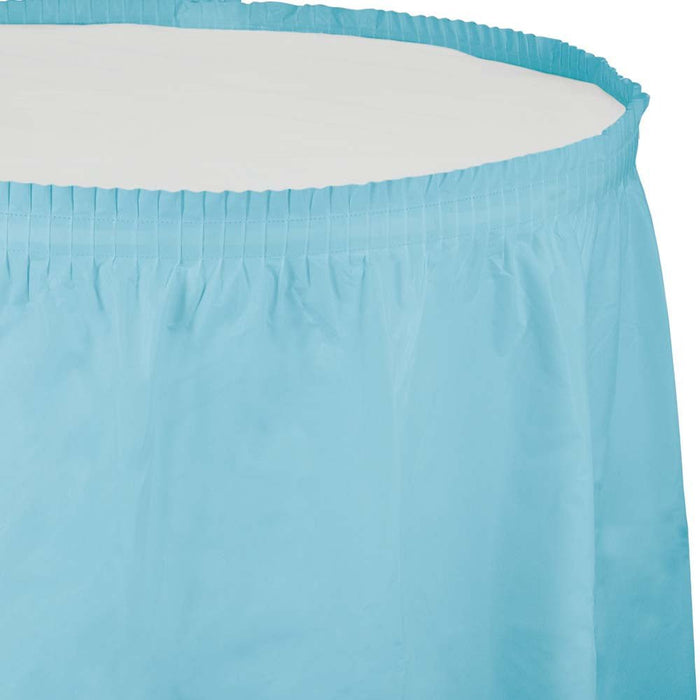 Light blue pleated table skirt with elastic waistband and draped fabric panels against a white background.
