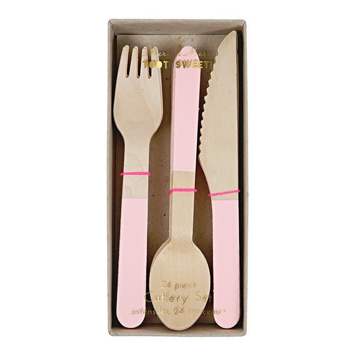 Three-piece wooden utensil set with pink handles and natural wood bowls, including a fork, knife, and spoon, packaged in a kraft box with pink accents.
