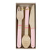 Three-piece wooden utensil set with pink handles and natural wood bowls, including a fork, knife, and spoon, packaged in a kraft box with pink accents.
