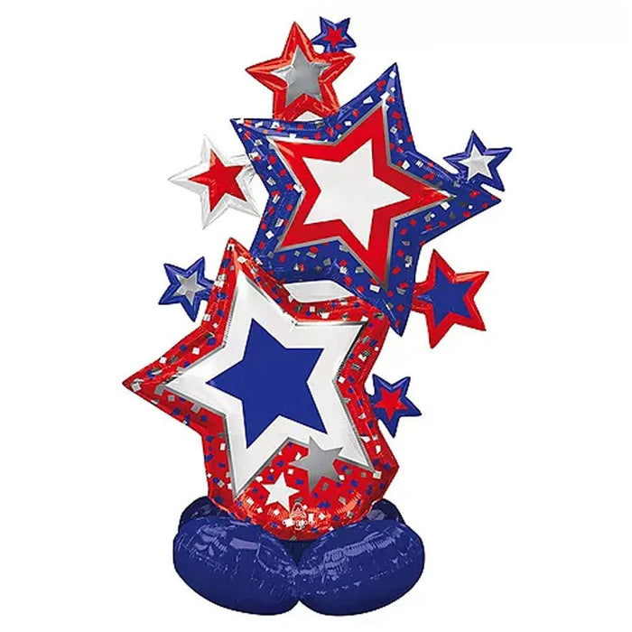 Tall stacked patriotic foil balloon featuring red, white, and blue stars of varying sizes arranged vertically with a dark blue cloud-shaped base.
