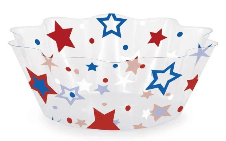 White fluted cupcake wrapper with red, blue, and pink stars of varying sizes and small dots in a patriotic design.