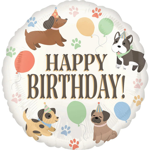 Round white mylar balloon with "Happy Birthday!" text in brown letters, decorated with four colorful dogs wearing party hats, colorful balloons, and paw prints throughout.