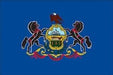 Pennsylvania state flag featuring two rearing horses supporting a golden coat of arms on a blue background, attached to a wooden stick.