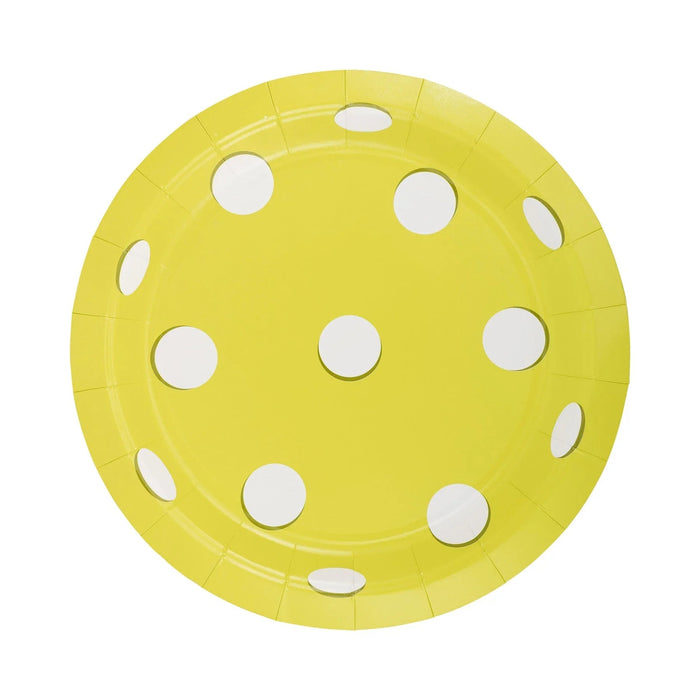 Bright yellow paper plate with white polka dots arranged around the surface and rim.