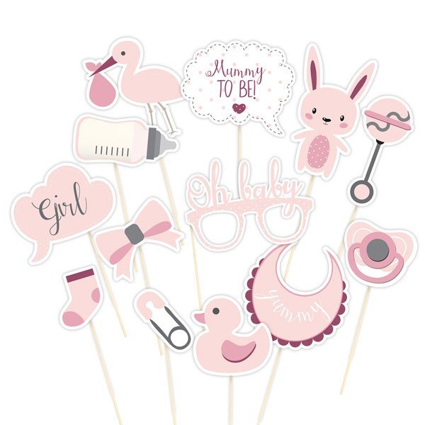 Set of 13 pink baby shower photo booth props on sticks including stork, bottle, pacifier, bunny, rattles, bibs, socks, bow, duck, glasses, and speech bubbles reading "girl," "oh baby," and "Mummy to be.